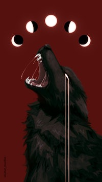 a black wolf with two moons in its mouth